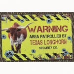 Warning Area Patrolled by Longhorns 8 x 12 Tin Sign