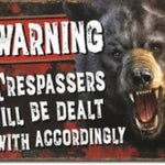 Warning Tresspassers Tin Sign